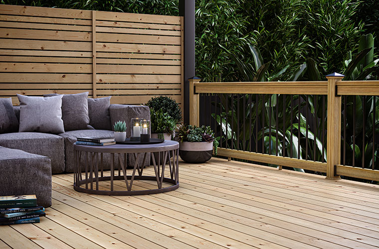 ProWood pressure-treated wood deck with 3-piece routed railing and wood accent all